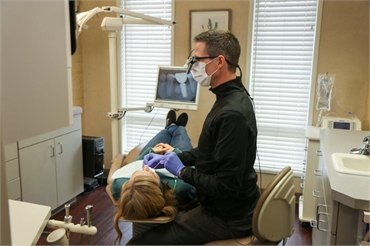Dr. Edward at work at his dental implants office Eite Dental