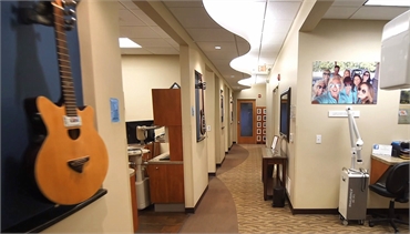 Guitar displays in the hallway at Milwaukee dentist Cigno Family Dental