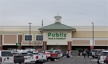 Publix Super Market at Monroe Pavilion at 14 minutes drive to the south of
