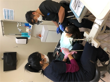 Toronto dentist Dr. Reyes performing root canal at North Shores Dental