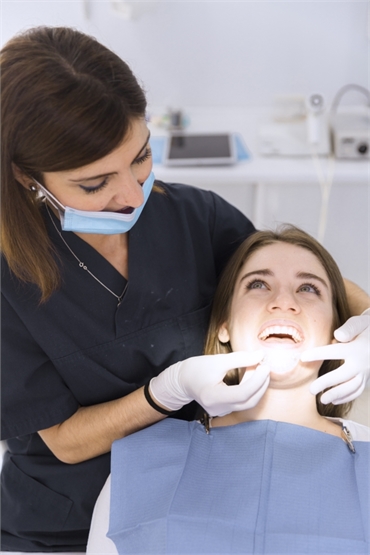 Steps involved in a dental cleaning procedure