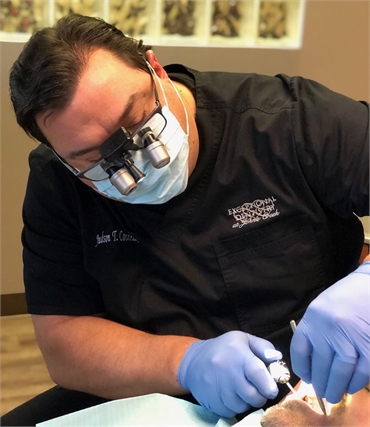 Atlanta dentist Exceptional Dentistry at Johns Creek Judson T. Connell DMD at work in his operatory