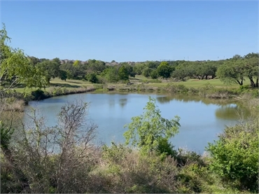 Brushy Creek Lake Park at 8 minutes drive to the east of Cedar Park orthodontist Smile in Style