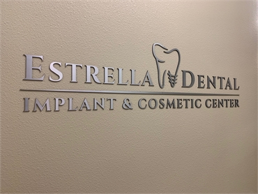 Signage on the wall near entrance at Chula Vista dentist Estrella Dental