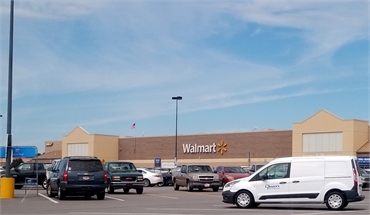 Walmart Supercenter at 2 minutes drive to the south of Bryant dentist Ouellette Family Dentistry