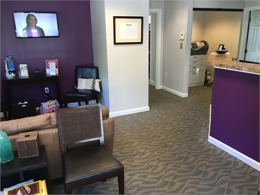 Waiting area and CEREC dental milling unit at Hanson dentist Freeman Dental Associates