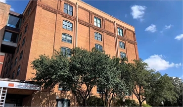 The Sixth Floor Museum at Dealey Plaza at 16 minutes drive to the south of Dallas dentist Lynn Denta
