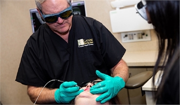 Laser dentistry procedure for treating gum disease at Lynn Dental Care