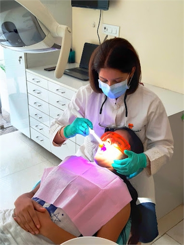 Dr. Vasundhara Arora Performing Precision Dental Implant Surgery