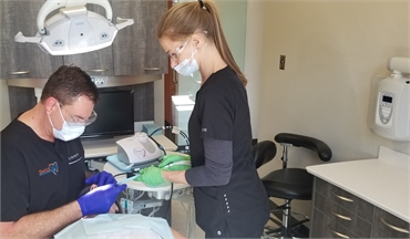 Riverview dentist Dr. Matthew Byars performing dental implants procedure at Smile 360 Implant and Fa