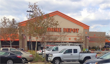 Home depot at 6 minutes drive to the south of Centro Dental Las Americas