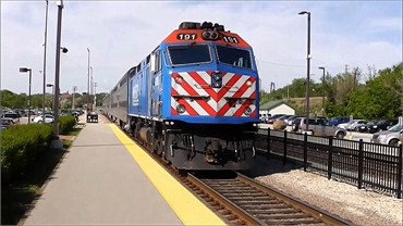 Metra BNSF train departing from Aurora Transportation Center 11 minutes drive to the east of Aurora 