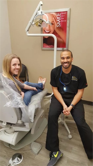 Katy dentist Jayson Wurtzbacher DDS  with patient at Sealy Dental Center in Katy