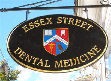 Signboard at Salem MA dentist Essex Street Dental Medicine
