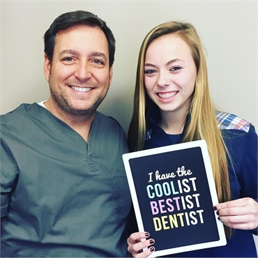 Columbia SC dentist Dr Griffin with happy patient at WildeWood Aesthetic Dentistry