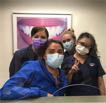 Salt Lake City general dentistry team using safety mask at Legacy Dental