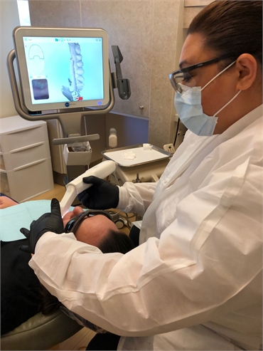 Dental hygienist working with iTero Intraoral Scanner at Dental Arts of Mountain View