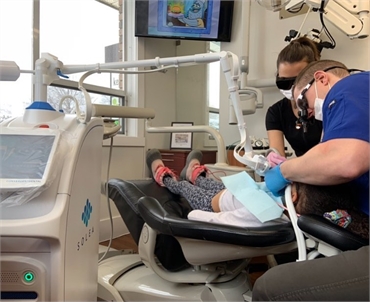 Dr. Webster using Solea laser for periodontal procedure at Kelowna Dental Centre