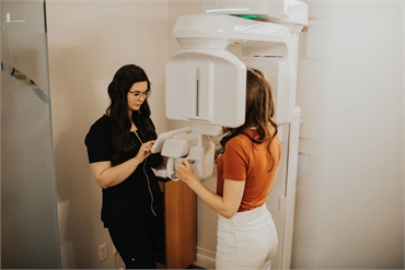 Dental assistant taking CBCT scan of patient at Kelowna Dental Centre