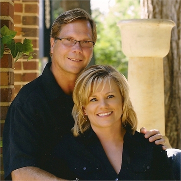 Huntersville dentist Dr John Merrill with wife