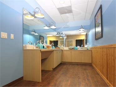Brush and floss station at Austin orthodontists and pediatric dentists Smiles of Austin