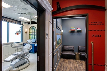 Train cabooze themed operatory entrance at Dripping Springs pediatric dentist Smiles of Dripping Spr