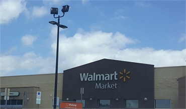 Walmart Neighborhood Market at a few paces to the west of Dallas dentist Glow Dental and Implant Cen