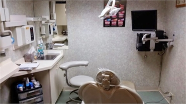Preparing for Invisalign braces procedure at A Caring Dental Group
